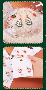 Detailed set of Christmas earrings featuring tree, Santa, elk and bell designs