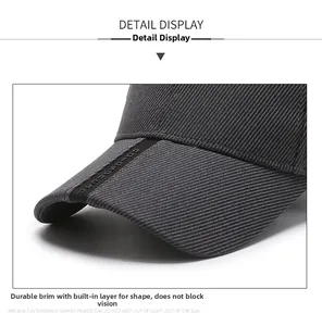 Detail view of the durable dark gray baseball cap brim with reinforced structured sandwich