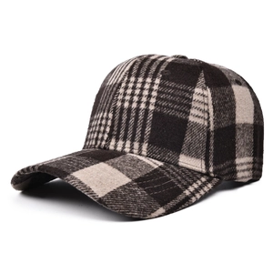 Close-up of thick plaid wool blend fabric on a stylish vintage baseball cap detail