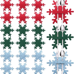 Christmas snowflake cutlery holders in red green and blue for festive table decoration