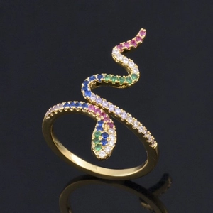Elegant gold snake ring featuring vibrant colorful zircon stones on a black mirror surface