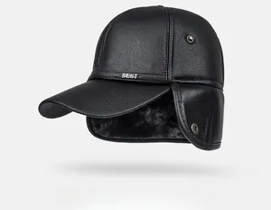 Detail of winter faux leather baseball cap with plush lining and ear flaps for men