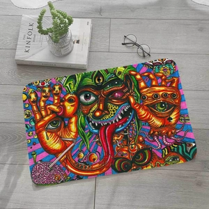 Detail view of psychedelic art flannel floor mat with vibrant colors on wood floor