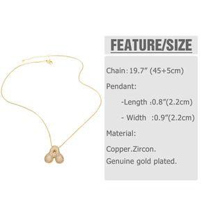 Detail view of gold plated bubble letter A pendant necklace with cubic zirconias