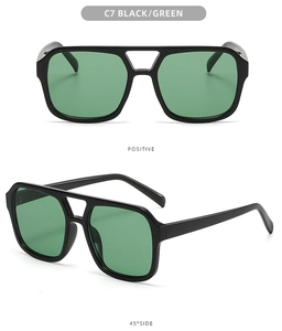 Classic double bridge pilot sunglasses with black frame and green lenses in dual view