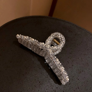 Elegant vintage bow hair claw clip with white pearls and sparkling silver rhinestones