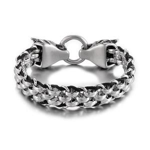 Men's leather rope bracelet with woven texture and silver double wolf head ring buckle