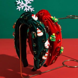 Detailansicht Samt-Weihnachtshaarreif mit Strasssteinen, Perlen und festlichen Figuren