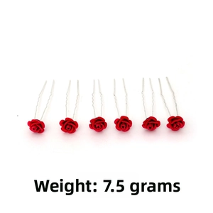 Detail of six U-shaped silver hair pins with red velvet rose tops, weight 7.5g