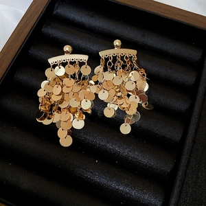 Elegant gold-tone round sequin tassel earrings in a luxury jewelry gift box