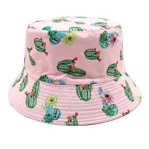 Detail showing pink cactus and succulent floral print on twill fabric bucket hat