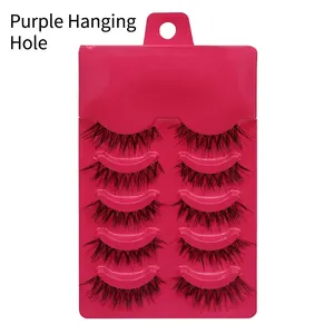 Detail of 5 pairs of natural manga false eyelashes with cross-design and clear lash bands