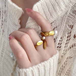 Hammered gold wide band ring with pearls and minimalist oval geometric ring set