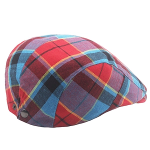 Classic British red and blue tartan beret hat with metallic side buckle decoration
