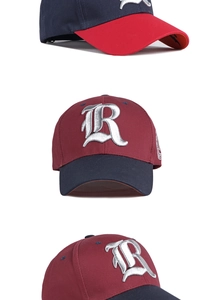 Detail of color-block baseball cap featuring premium 3D gothic R embroidery and side badge
