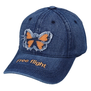 Distressed blue denim baseball cap with butterfly patch and Free Flight embroidery