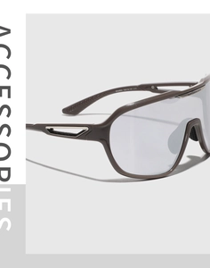 Detail view of taupe Y2K oversized sunglasses showing silver hinge and 95360 model specs