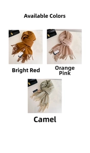 Detailed view of 100% wool scarves with fringe in camel, pink, and sage green colors