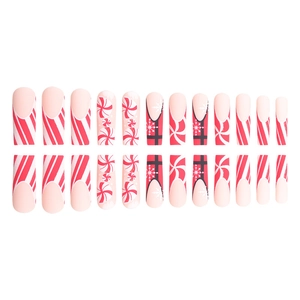 Christmas red glitter press-on nails with candy stripes and white snowflake patterns