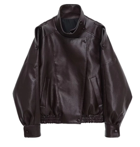 Detailed close-up of dark brown leather jacket featuring stand collar and textured grain finish