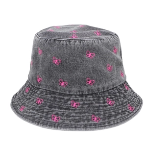 Fashionable washed denim bucket hat for women featuring pink butterfly embroidery