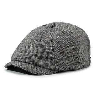 Close-up of vintage newsboy cap showing detailed breathable linen-cotton texture and seams