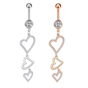Detailed comparison of heart-shaped belly rings in silver and rose gold finishes