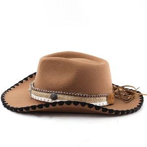 Detail of brown felt cowboy hat with black scalloped edges, braided rope and star accents