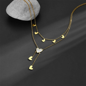 Golden double-layer Y-shaped heart necklace with white shell pendant and tassel fringe