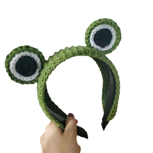 Süßes grünes Strick-Stirnband mit Froschaugen für Damen im weichen Häkeldesign