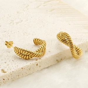 18K gold plated twisted C-shape geometric hoop earrings on a stone decorative base