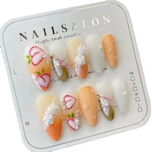 Handmade stiletto press-on nails with white roses and peach patterns in fresh spring style