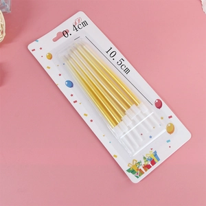 Close-up of six metallic gold pencil candles on pink background measuring 10.5cm long