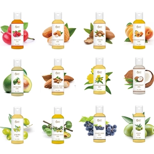 Collection of natural plant carrier oils in 4 fl oz bottles including jojoba and coconut oil