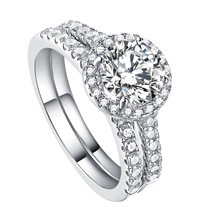 Macro view of 1.2 carat zircon ring set with halo setting and micro-pave silver bands