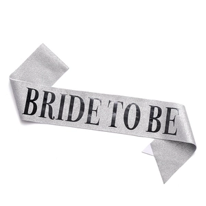 Silver glitter Bride To Be party sash with bold black lettering for bachelorette events