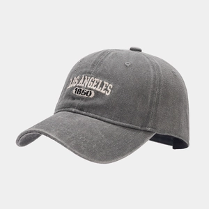Detailed embroidery of Los Angeles 1850 on a vintage washed grey cotton baseball cap