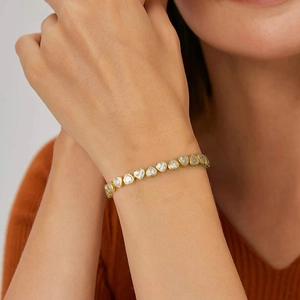 Elegant gold S925 sterling silver heart-shaped tennis bracelet with sparkling zircons