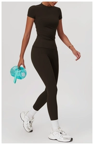 Close-up of espresso brown quick-dry yoga set showing slim fit cut and premium matte fabric