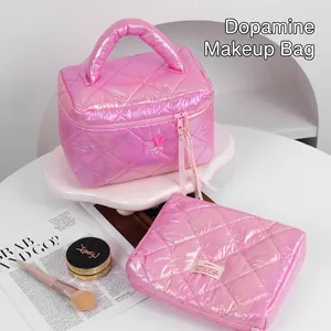 Glossy pink quilted makeup bag set with top handle and iridescent metallic finish