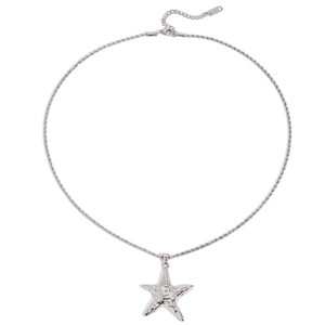 Detail shot of silver starfish pendant necklace with textured finish on a cable chain