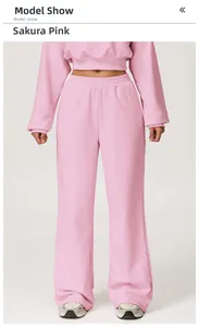 Close-up of high-waist drawstring waistband on cherry pink wide-leg sports sweatpants