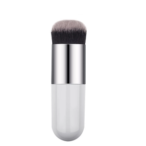 Macro detail of dense synthetic bristles and silver ferrule of the chubby foundation brush