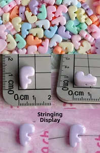 Detail showing macaron color resin letter F beads with hole design and dimensions