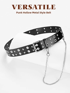 Detail view of black punk belt featuring silver star eyelets and a detachable metal chain