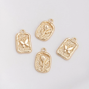 14K gold plated rectangular pendants with embossed butterfly and tulip floral patterns