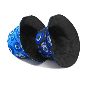 Evil eye pattern bucket hats in light and dark blue styles for sun protection