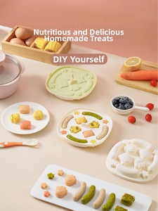 Close-up of silicone sausage mold with star and cat paw shapes for DIY baby food making