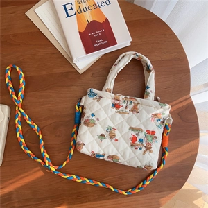 Quilted mini crossbody bag featuring cute rabbit print and colorful braided strap