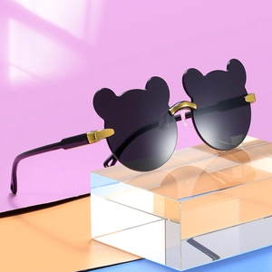 Cute bear-eared kids' sunglasses with black gradient lenses and golden metal bridges